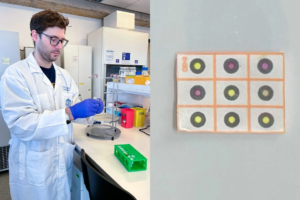 Justin Vigar, pictured here in a lab in South America, is developing paper-based diagnostics like the paper chip shown on the right, where each dot represents a different test